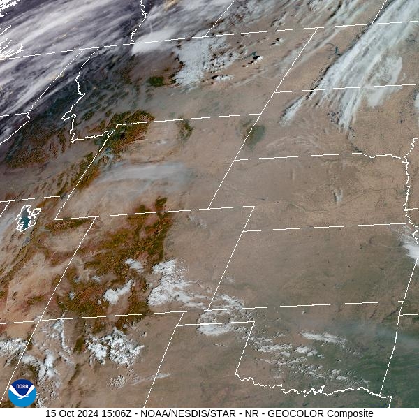 Tuesday morning’s satellite shows widespread smoke lingering over the Northern Rockies because of numerous regional wildfires.